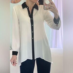 Chico's White Blouse with black lace accents.